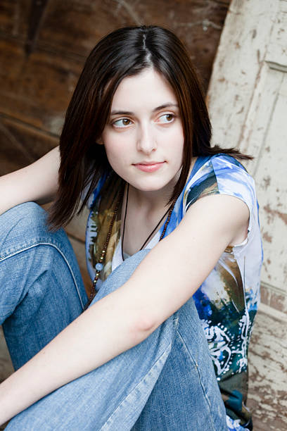 istock Girl Against a Old Door 174690753