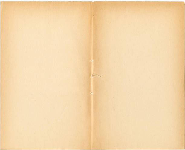istock Two pages from an old book isolated on white 174691232