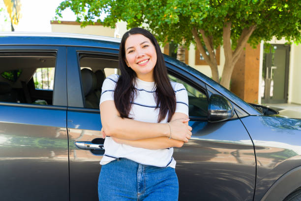 istock Caucasian woman working as a driver for a ride share app 1746912577