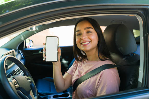 istock Female driver working as a ride share app driver in the car 1746913839