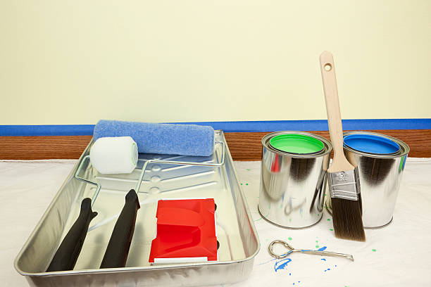 istock Green and Blue Paint with Brushes, Rollers in Tray. 174691578