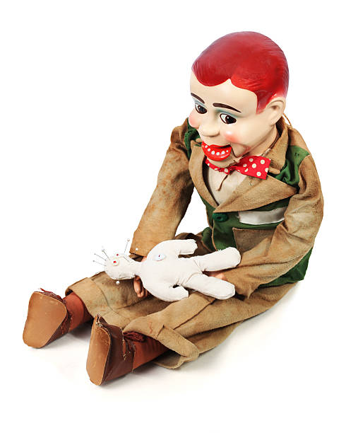 istock Ventriloquist's Dummy and voodoo doll 174691628