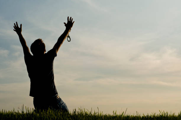istock A celebration of freedom expression of raised arms 174691886