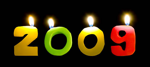istock new year 2009 candles on black background 174692058