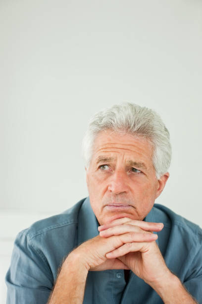 istock Tensed retired old man looking away 174692161