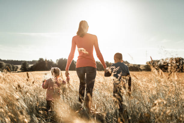 istock Family walking in the meadow. 1746922242