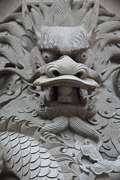 istock Chinese dragon in granite sculpture 174692375