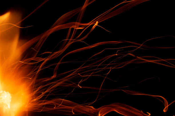 istock light ribbons of sparks on a black background, long exposure 1746925713