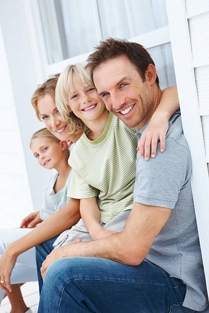 istock Happy parents sitting with their children 174692823