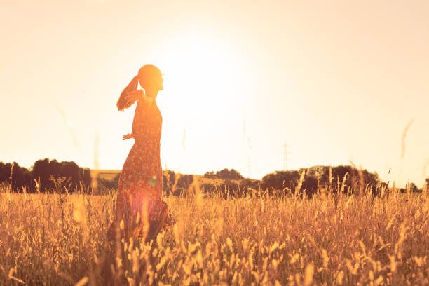 istock Woman in the meadow. 1746928395
