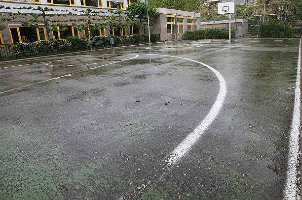 istock Empy Basketball Field after the Rain 174693148