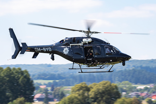 Sliac, Slovakia - August 27, 2016: Government police helicopter at airport. Aviation and aircraft. Commercial and general aviation. Aviation industry. Fly and flying.