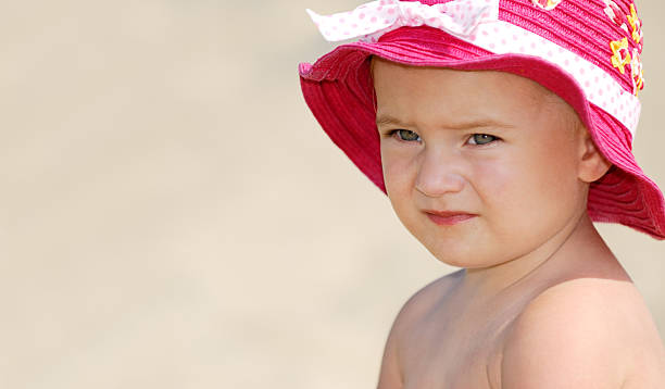 istock Baby girl on the beach 174694027