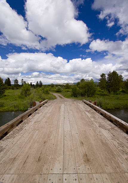 Wooden bridge with a beautiful clouldy background stock photo