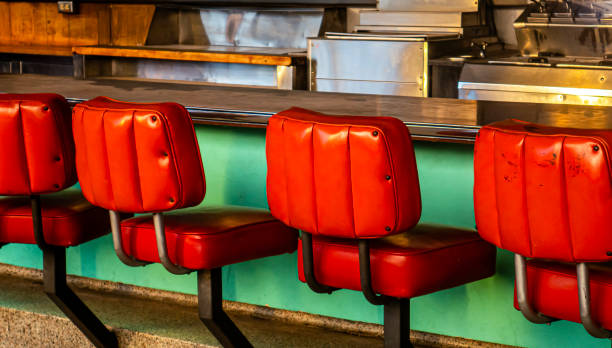 istock Orange diner seats at a green booth 1746946808
