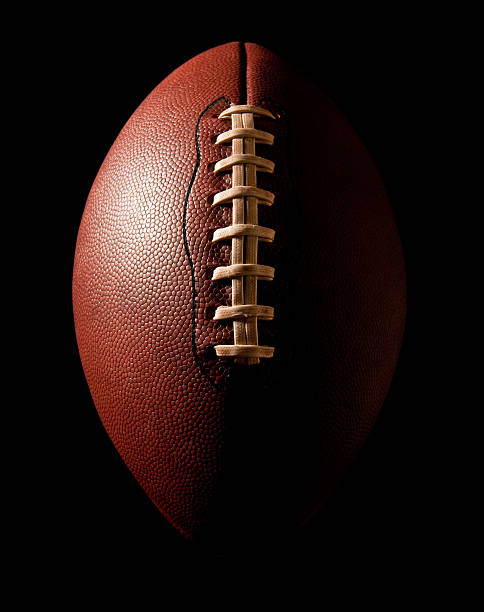 istock football on black 174694729