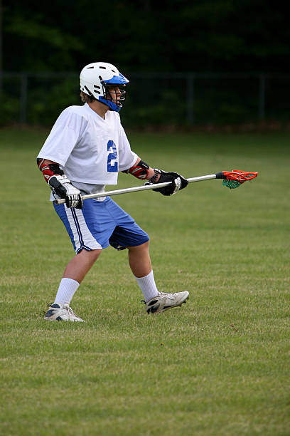 istock teenage lacrosse player 174694967