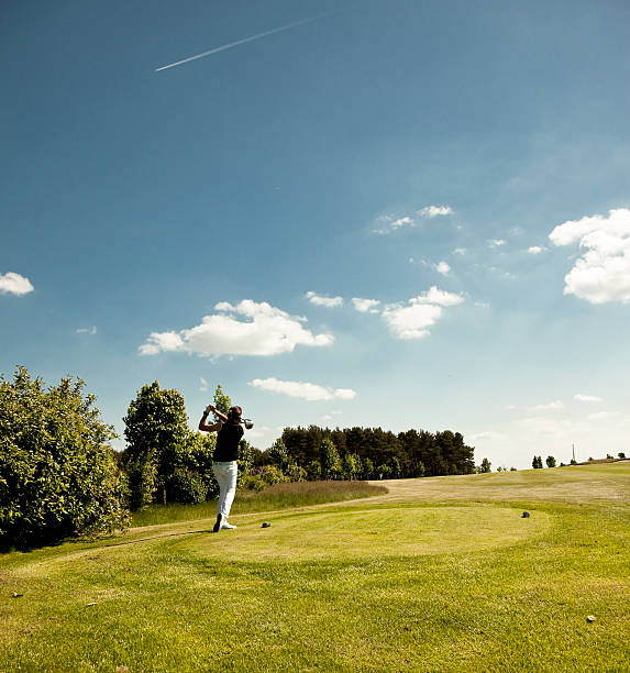 istock young woman playing golf, sport 174695015