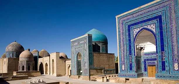 "Samarkand, The avenue of Tombs.Uzbekistanaas and surely one of the Worlds most glorious cities with its high profile attractions. The Registan, Guri Mamir, Bibi-Khanym Mosques Shahr-i-Zindah and the bazaar.As the poet Elroy Flecker wroteWe travel not for trafficking alone,By hotter winds our fiery hearts are fanned,For lust of knowing what should not be known,We take the golden road to Samarkand"