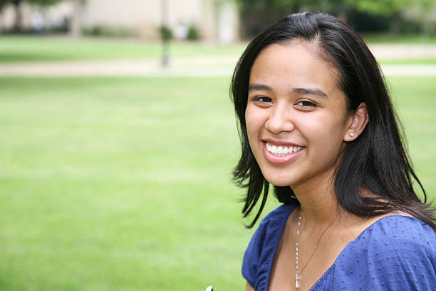 Cute College Girl on Campus, with Copy Space.
