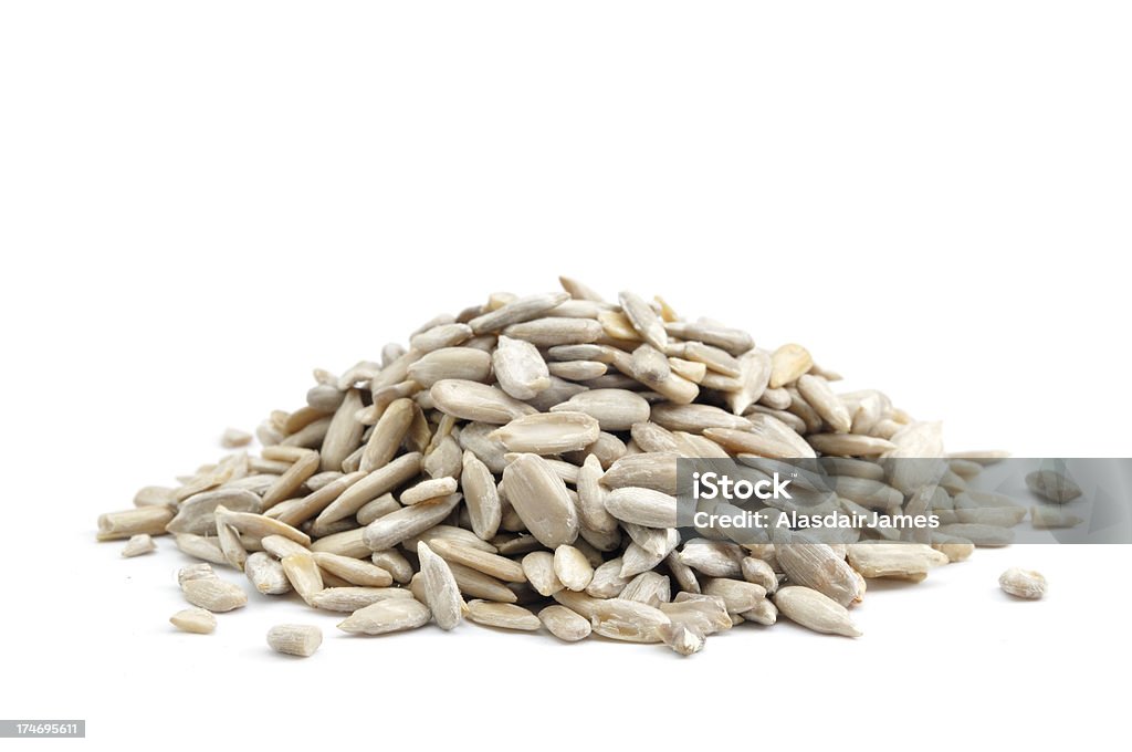 Pilha de sementes de girassol - Foto de stock de Semente de Girassol royalty-free