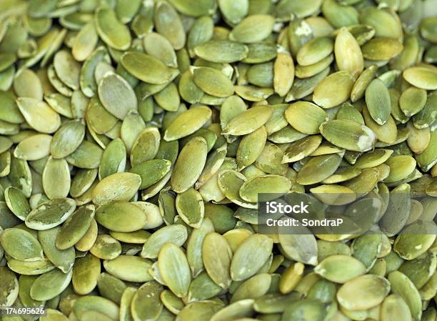 Roasted Pumpkin Seeds Stock Photo - Download Image Now - Backgrounds, Color Image, Food
