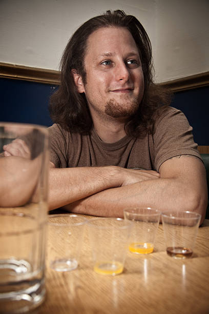 Man sitting in a restaurant or bar stock photo