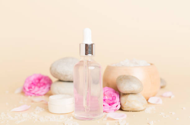 istock Spa composition with pink roses on wooden table 1746966512