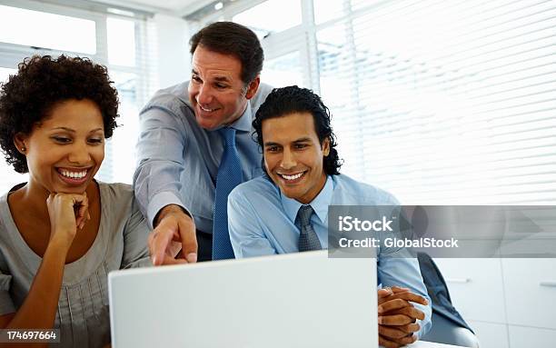 Group Of Business People Working Together Stock Photo - Download Image Now - 20-24 Years, 40-44 Years, Achievement