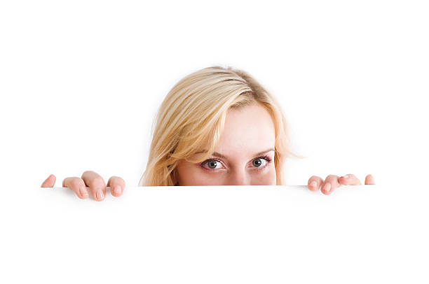 istock Attractive woman holding a billboard 174697783