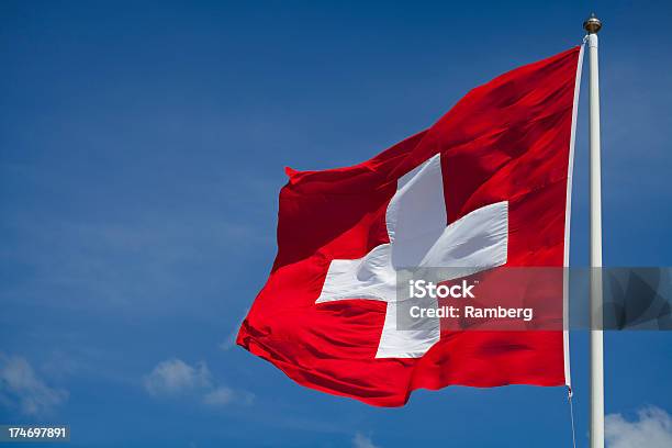 Switzerlands National Flag Flying Stock Photo - Download Image Now - Swiss Flag, Switzerland, Flag