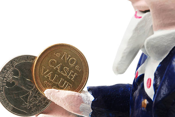 Uncle Sam with money Uncle sam bank part with quarter and no cash value money. This is a part of old cast iron mechanical bank. uncle sam broke stock pictures, royalty-free photos & images