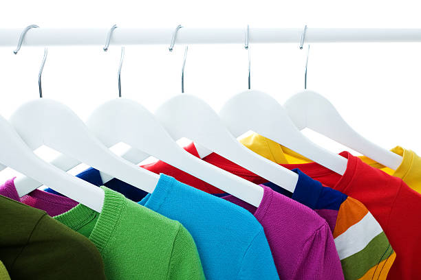 istock Colorful Tops Hanging On White Hangers 174697975