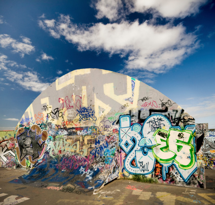 Huge graffiti ramp with a blue sky