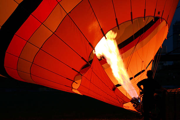 istock heating up the hot-air balloon 174698417