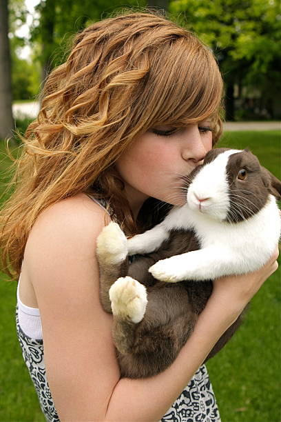 istock Girl Kissing Rabbit 174698507