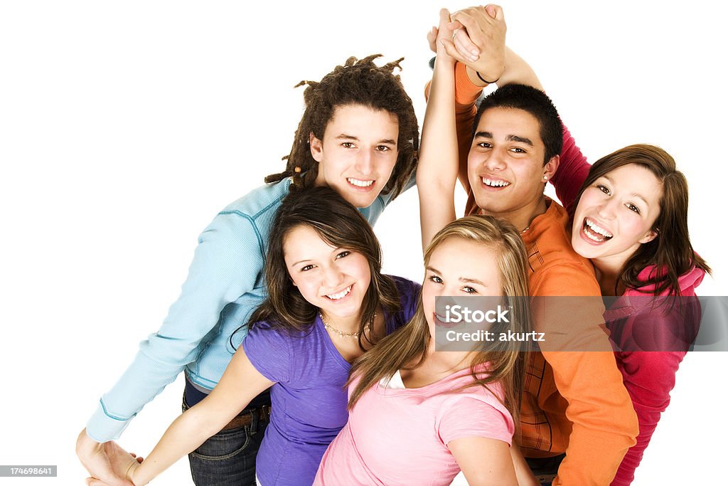 Diverse group of Teenagers five people playing action isolated smiling Activity Stock Photo