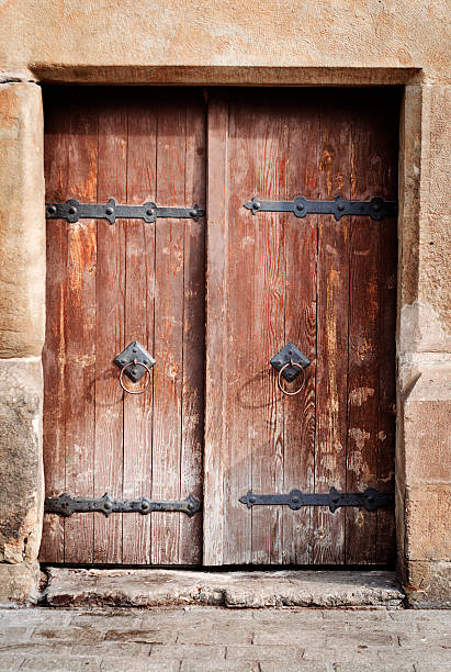 istock ancient wooden door 174698966