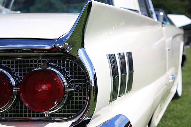 istock Vintage American car showing tail light and fin section 174699121