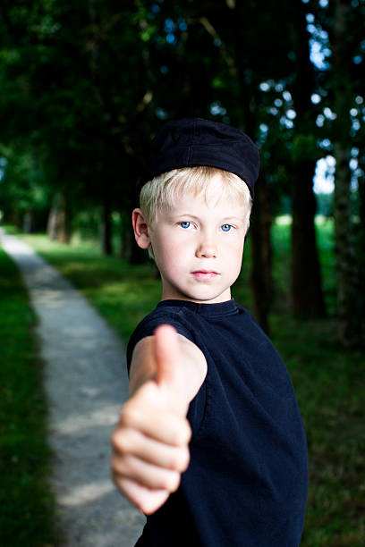 istock Cute Boy Giving A Thumbs Up 174699635