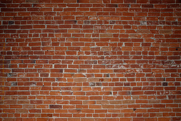 Old red brick wall stock photo