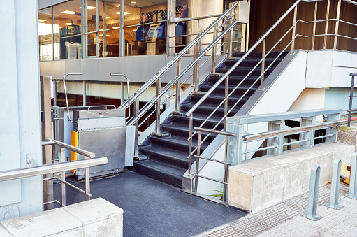 disabled wheelchair access elevator entrance to a building background