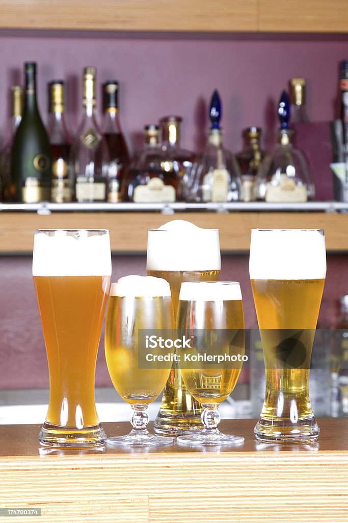 Diversi bicchieri di birra - Foto stock royalty-free di Alchol