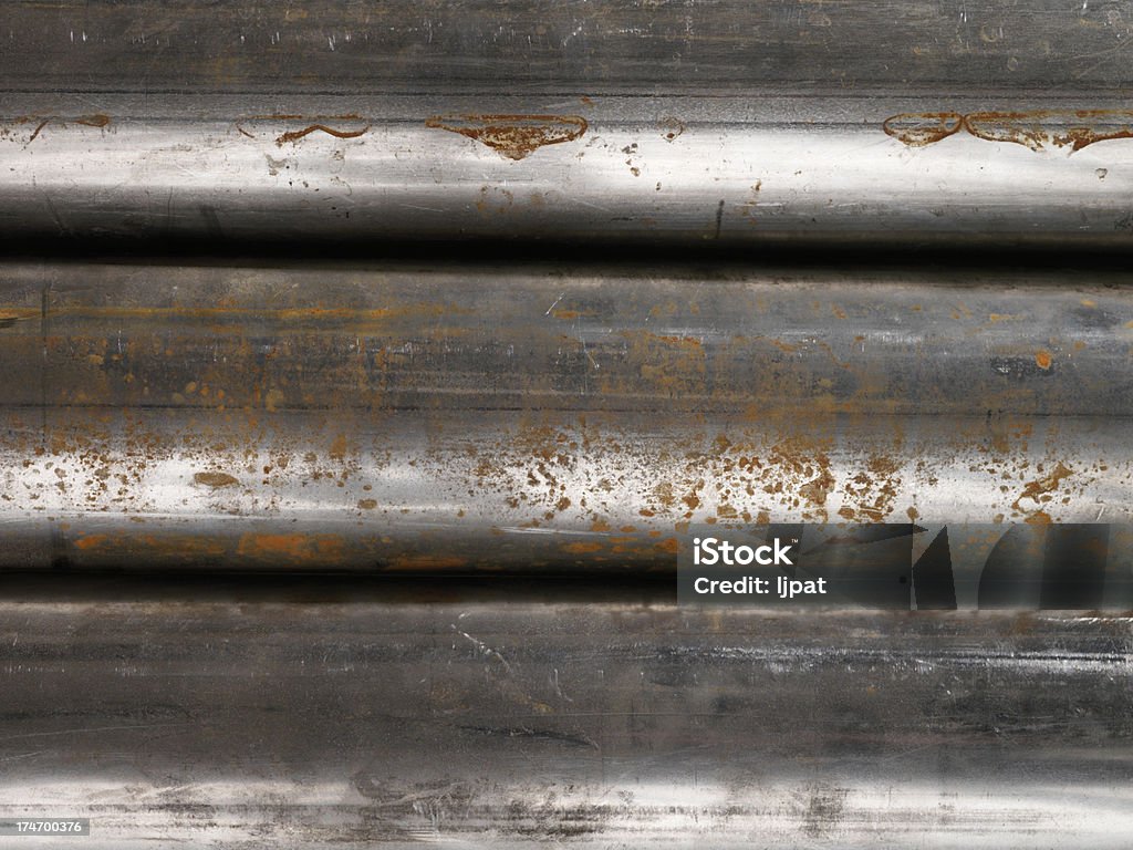 Detalhes de alta resolução de Rusty tubos de fundo - Foto de stock de Aço royalty-free
