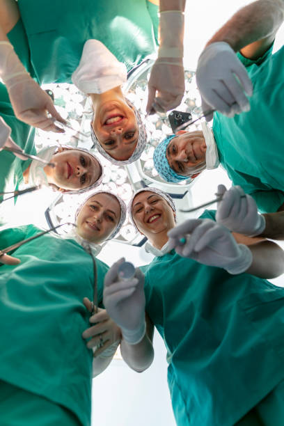 istock Team of nurses and surgeons in surgery. 1747004826
