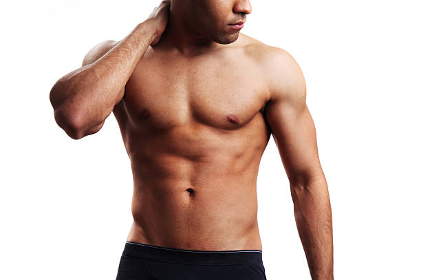 Faceless male torso A shirtless male torso of a healthy fit young guy in underwear. man muscular chest stock pictures, royalty-free photos & images