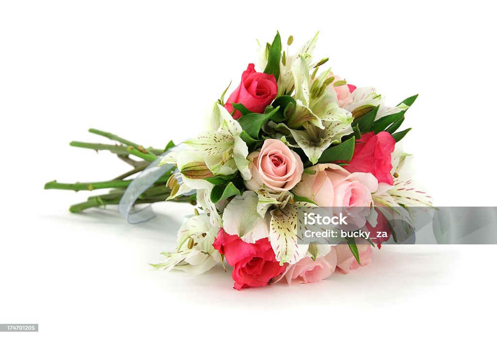 Multi flower bouquet tied with white ribbon lying on side "For more bouquets and posys isolated on white, please visit my bouquets lightbox by clicking on the image below." Bouquet Stock Photo
