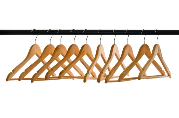 istock Row of wooden empty hangers 174701408