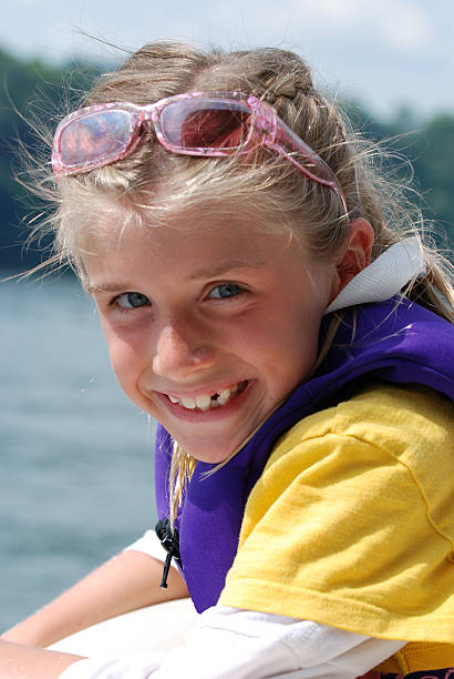 istock Little Girl Riding on Boat 174701455