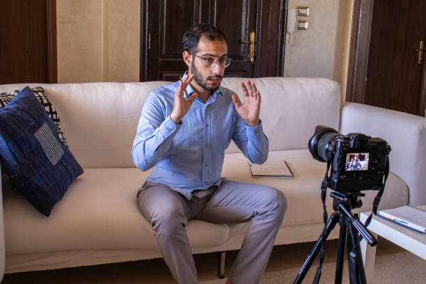 istock Young arabic man conducting a seminar from home 1747014698